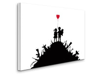 a silhouette of a couple holding a red balloon on top of a hill