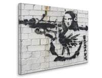 a white brick wall with a painting of a woman holding a gun
