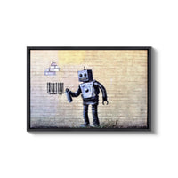 a picture of a robot spray painting on a wall