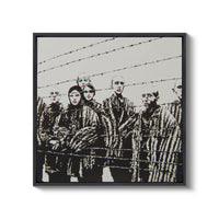 a black and white photo of a group of people behind barbed wire