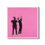 a pink poster with two men in silhouettes