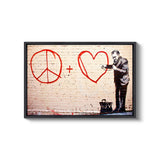 a brick wall with a painting of a man holding a peace sign