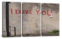 a wall with graffiti on it that says i love you