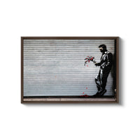 a painting of a man holding a flower in front of a garage door