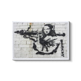 a painting of a woman with a gun on a brick wall