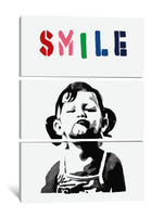 a picture of a child's face with the word smile painted on it