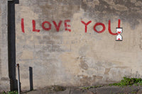 graffiti on a wall that says i love you