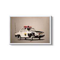 a black and white picture of a police car