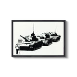 a black and white photo of two tanks