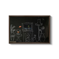 a blackboard with a drawing of a living room