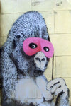 a painting of a monkey with a pink mask