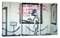 three panels of graffiti on a white wall