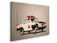 a picture of a police car painted on a canvas