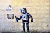 a graffiti of a robot holding a can of paint