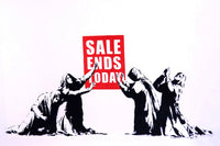a group of people holding a sale ends today sign